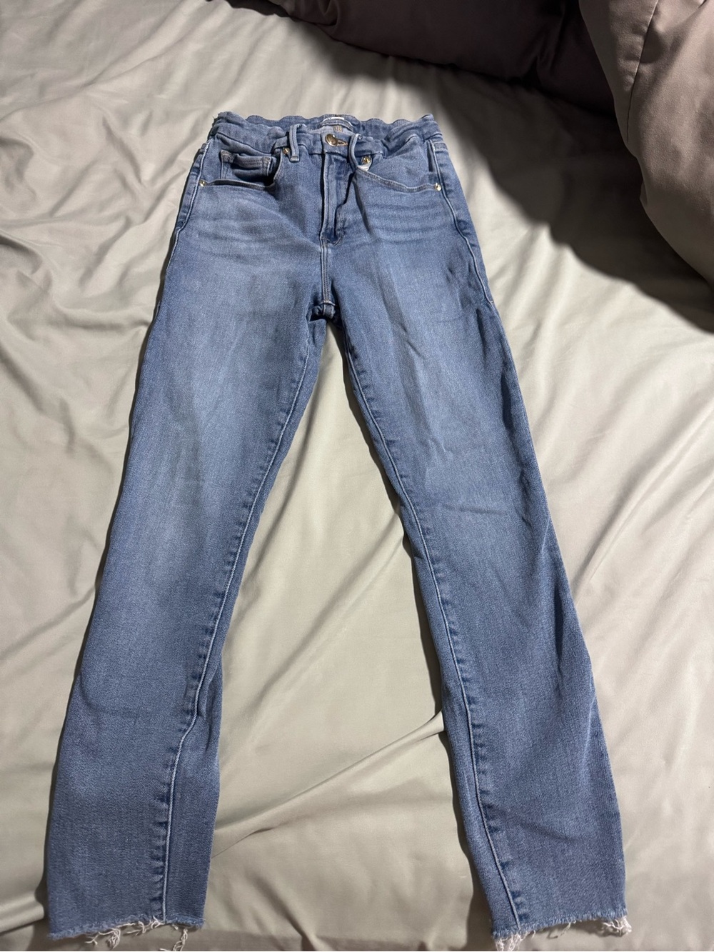 Good American Light Blue Skinny Jeans with Frayed Hem